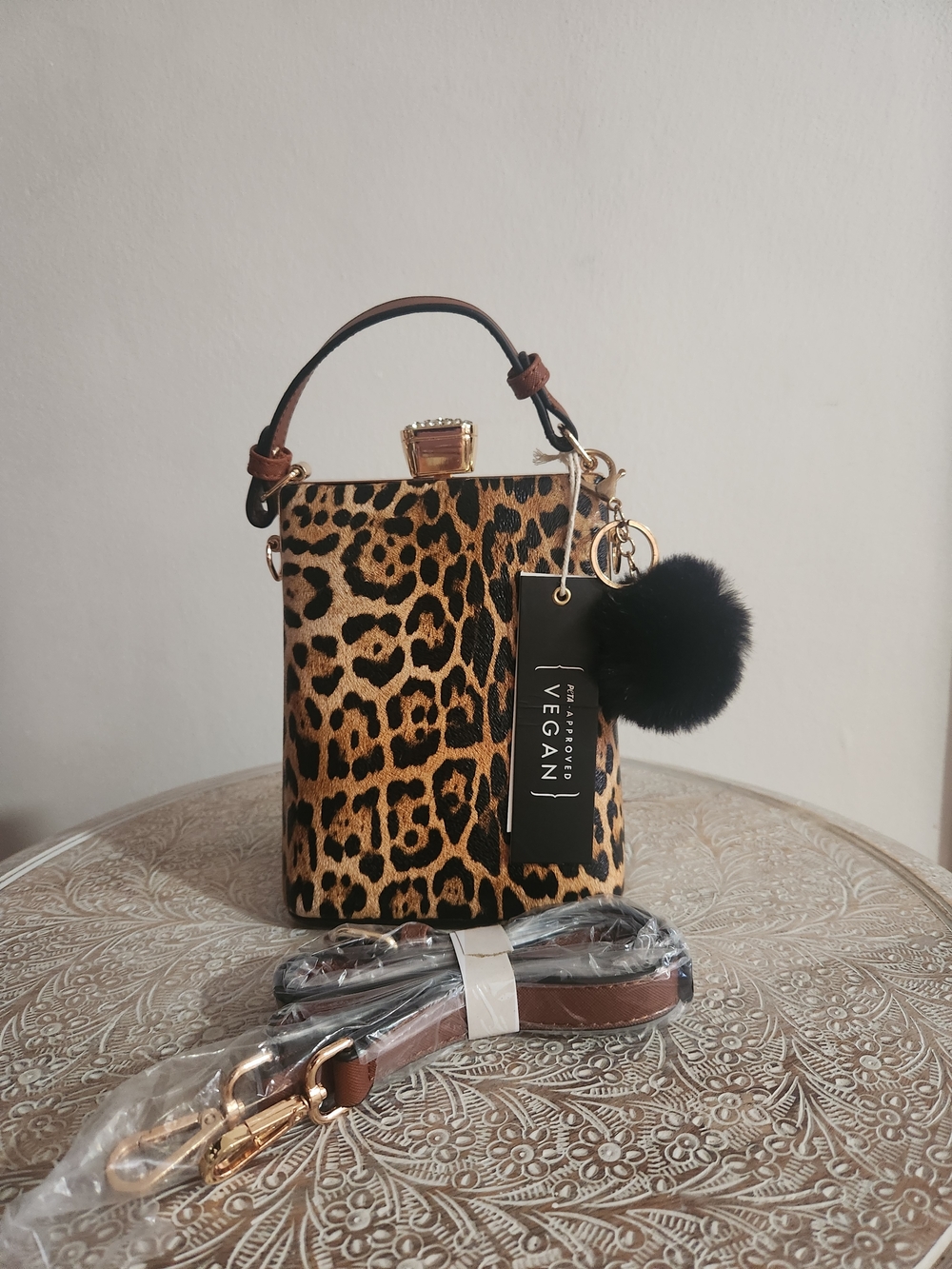 Leopard Print Mini Top-Handle Bag with Black Pom Pom